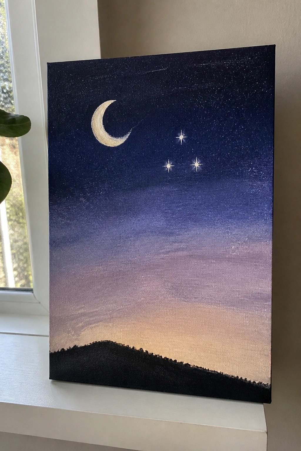 Painting of crescent moon and stars in gradient blue-purple sky above black hill