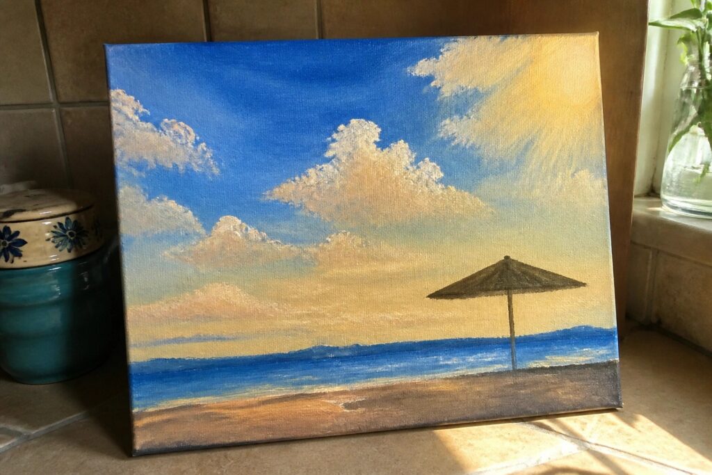 Painting of sunny beach with black umbrella on sand, striped ocean, and cloudy sky.