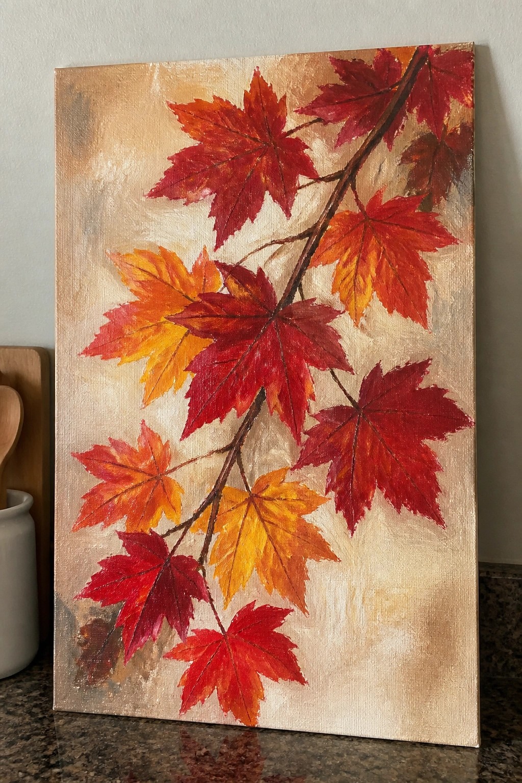 Vibrant painting of autumn maple leaves in red, orange, and yellow hues on branches