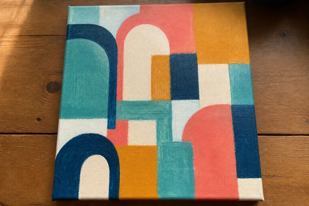 22 Colorful Acrylic Painting Ideas to Brighten Any Room Instantly Abstract canvas painting with colorful overlapping arches in orange, teal, and yellow