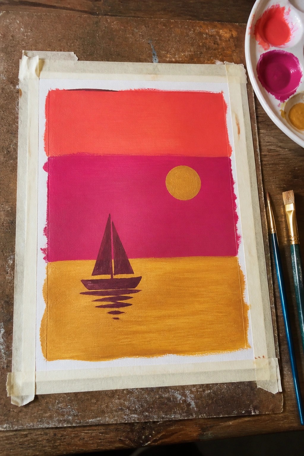 Layered red-pink sunset painting with purple sailboat, yellow sun, palette and brushes.