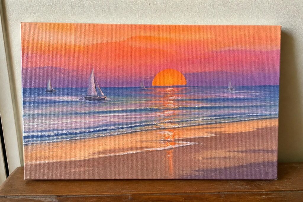 Vibrant sunset painting with orange sun, three sailboats on reflective colorful sea.