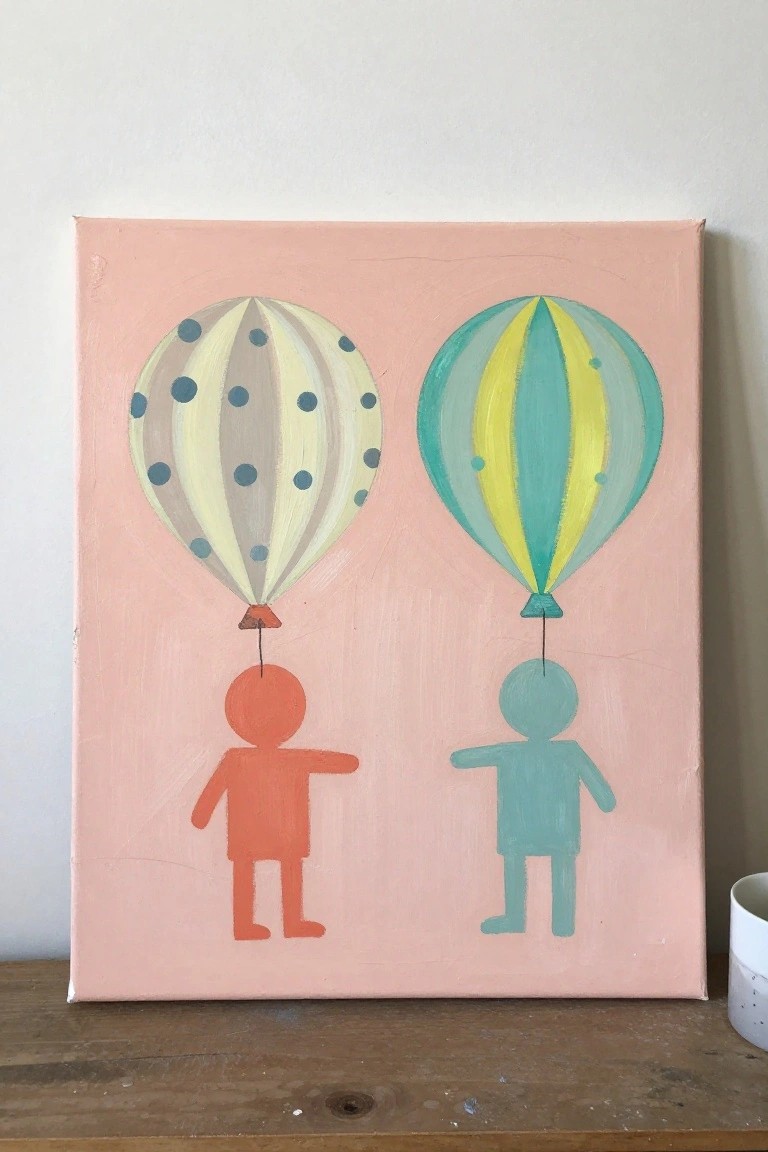 Two hot air balloons with orange and teal stick figures on pink canvas.