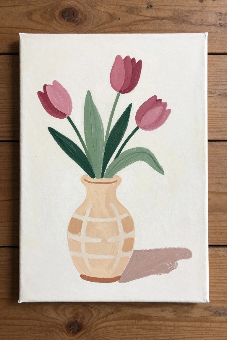 Three pink tulips in a grid-patterned beige vase with green leaves