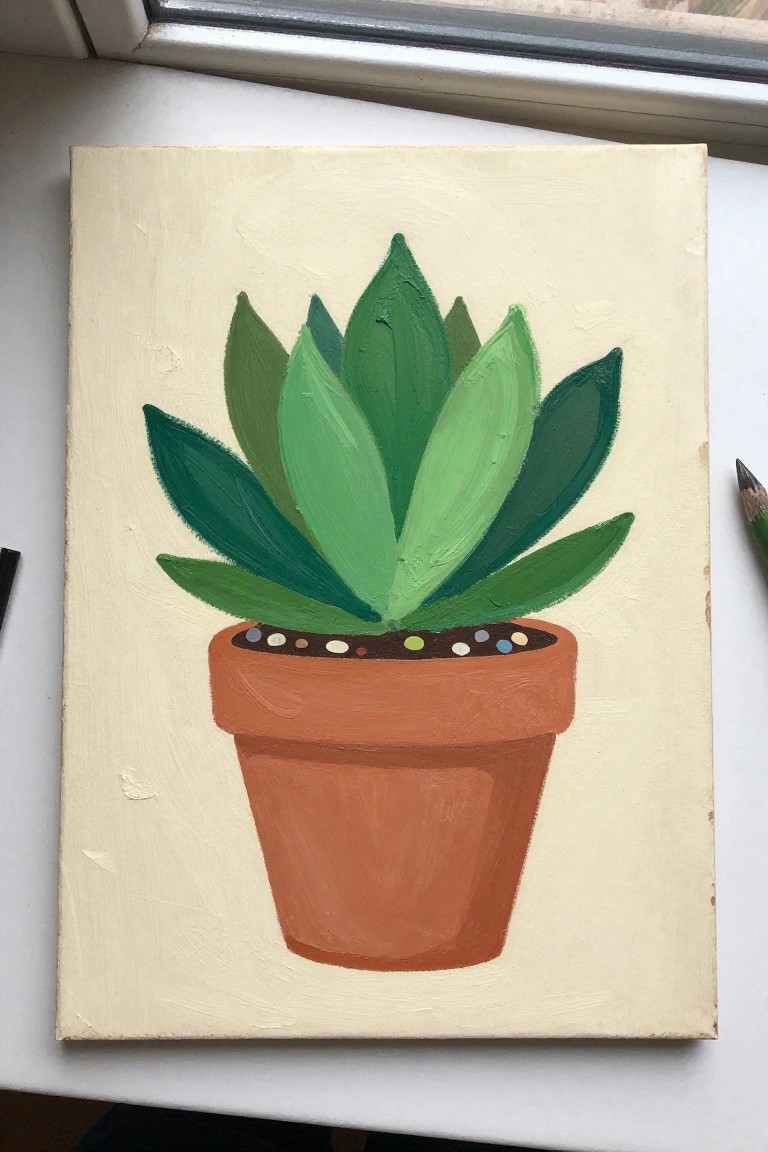 Green succulent plant in orange terracotta pot with colorful dots on beige canvas