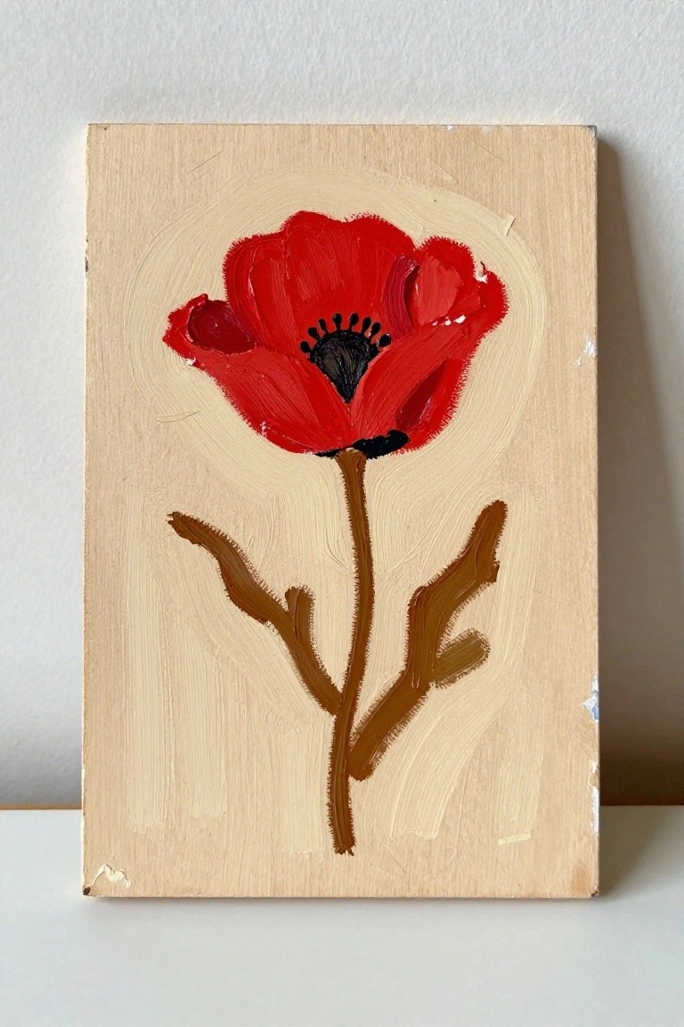 A small acrylic painting of a red poppy with black center and brown stem on a light background.