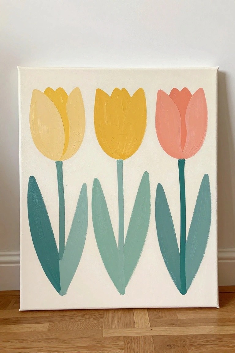 Three abstract tulips in yellow and coral with teal leaves on white canvas.