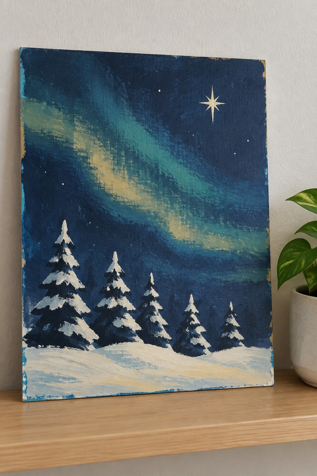 Winter painting of snow-covered pines under aurora borealis and bright star