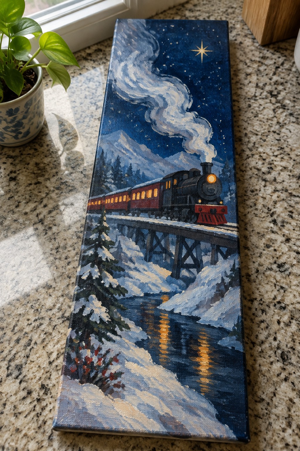 Steam train crossing snowy bridge over river under starry mountain night sky