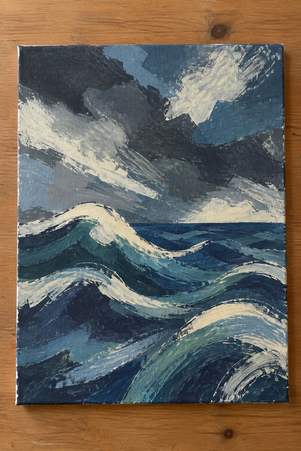 Abstract painting of turbulent dark blue ocean waves with white foam under stormy sky