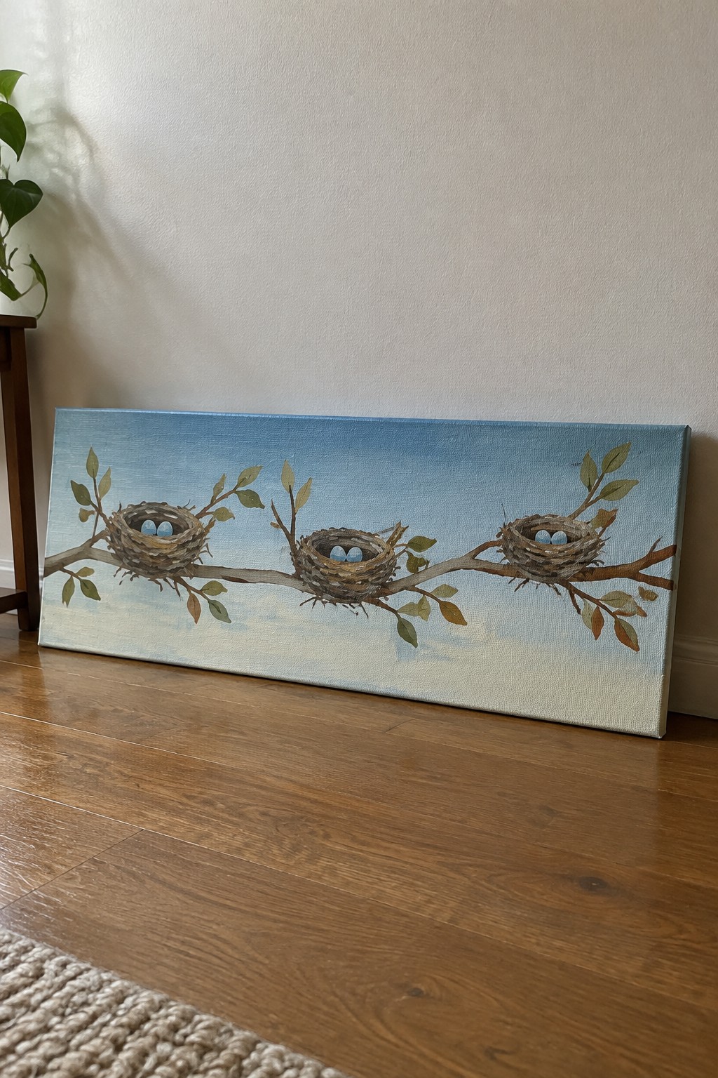 Three bird nests with blue eggs on branches against a blue sky painting