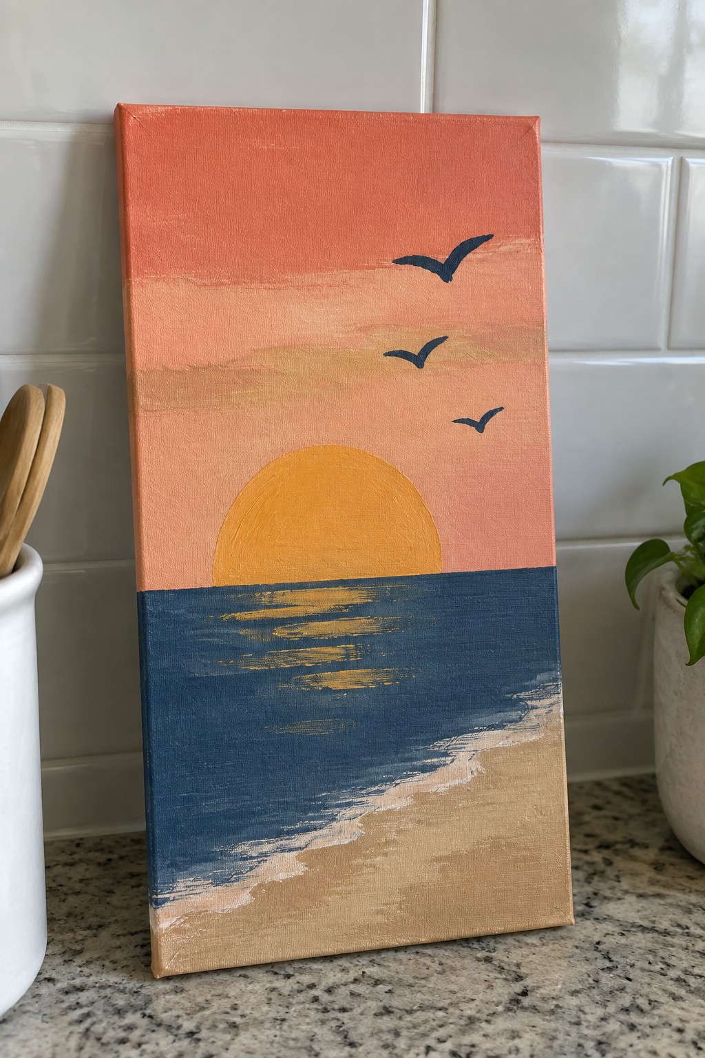 Canvas painting of sunset beach with orange sky, yellow sun, blue ocean, and birds