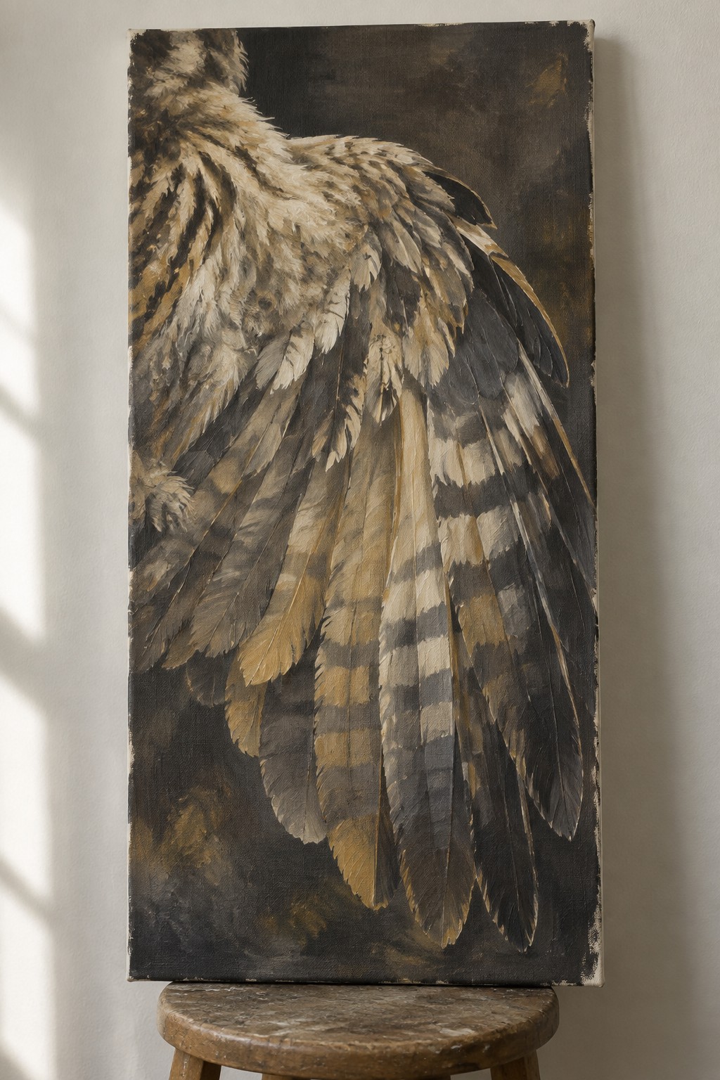 Realistic painting of detailed owl wing with brown striped feathers on canvas