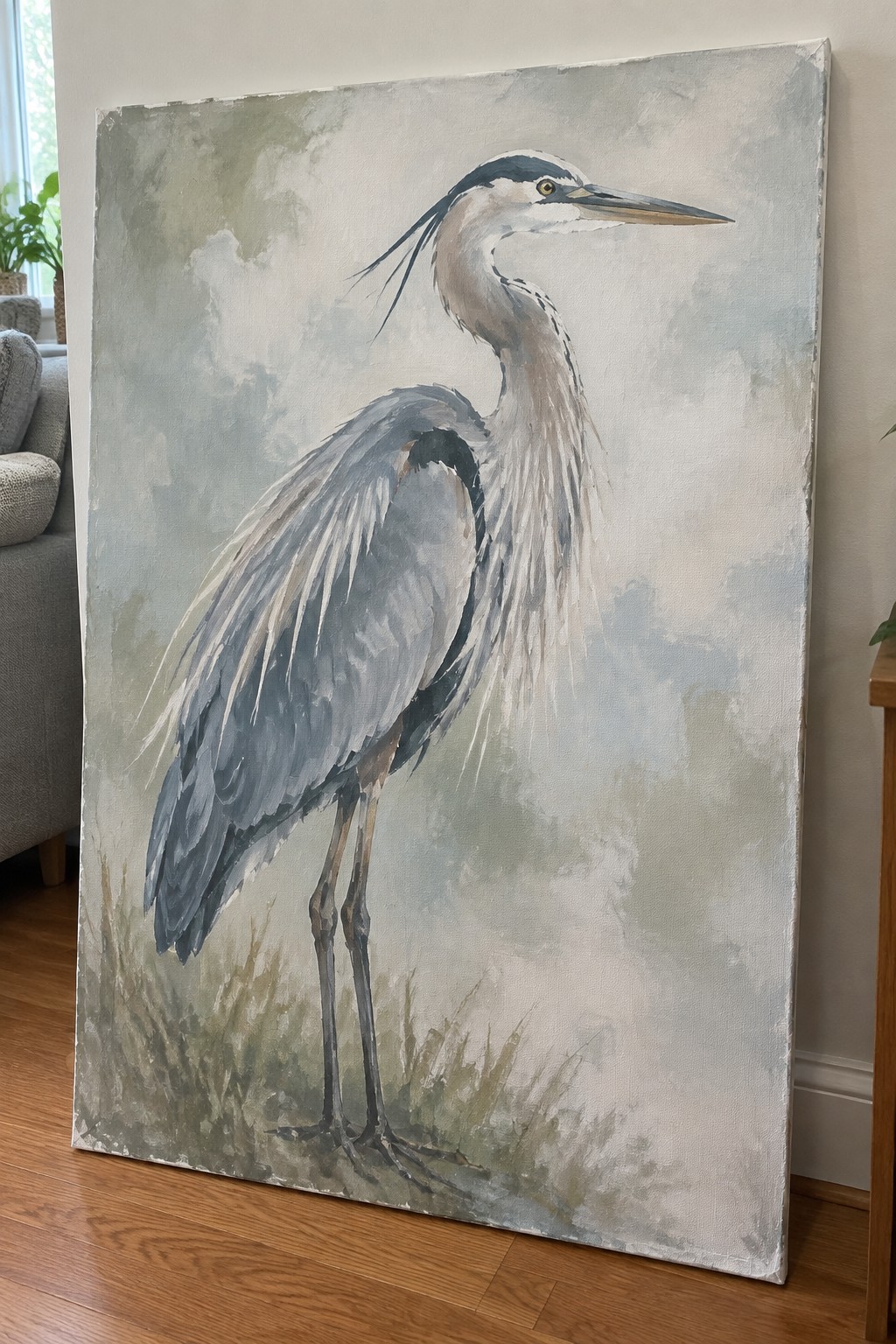 Large blue heron painting with long neck, legs, and soft misty background