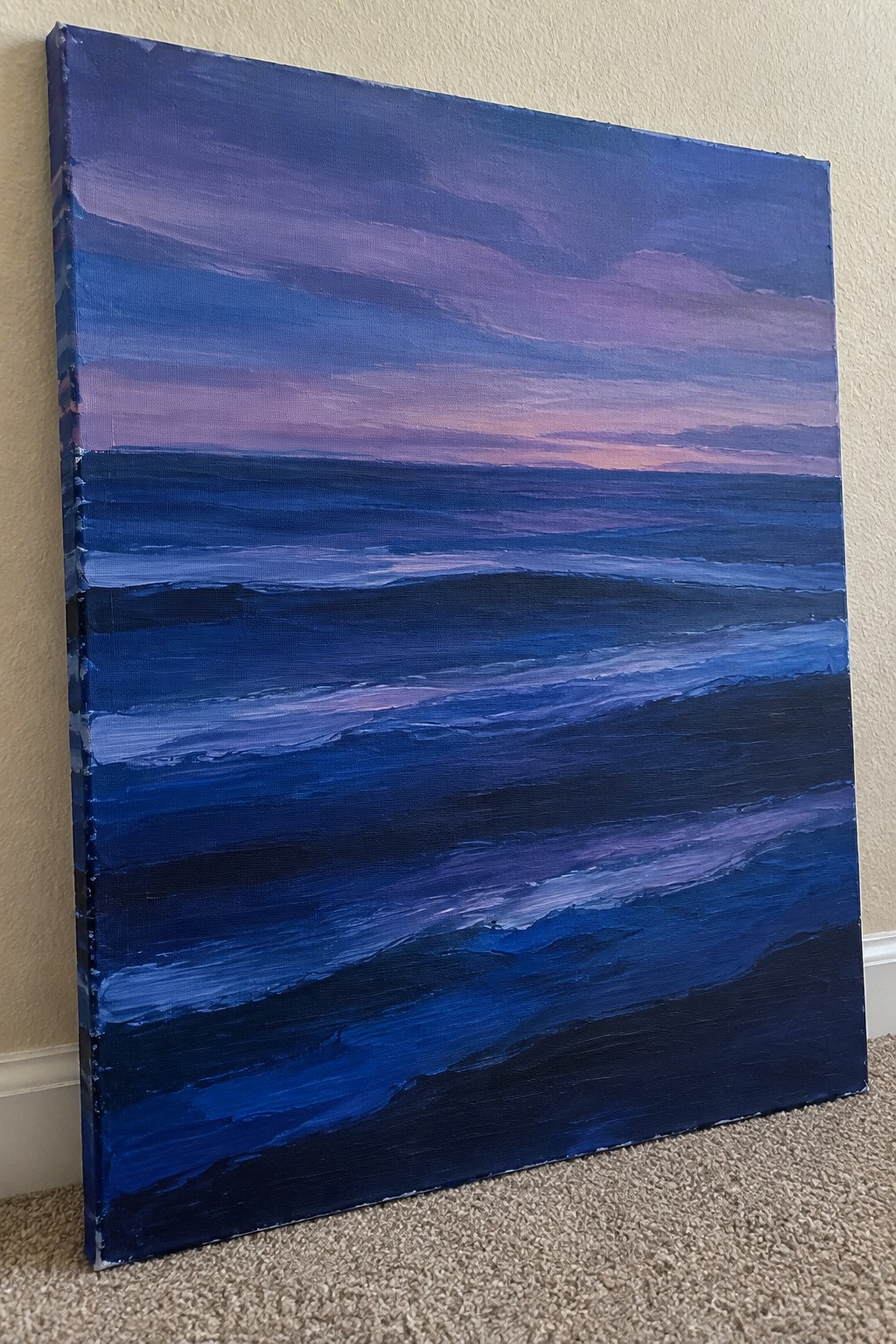 Canvas painting of layered blue ocean waves under purple-pink twilight sky
