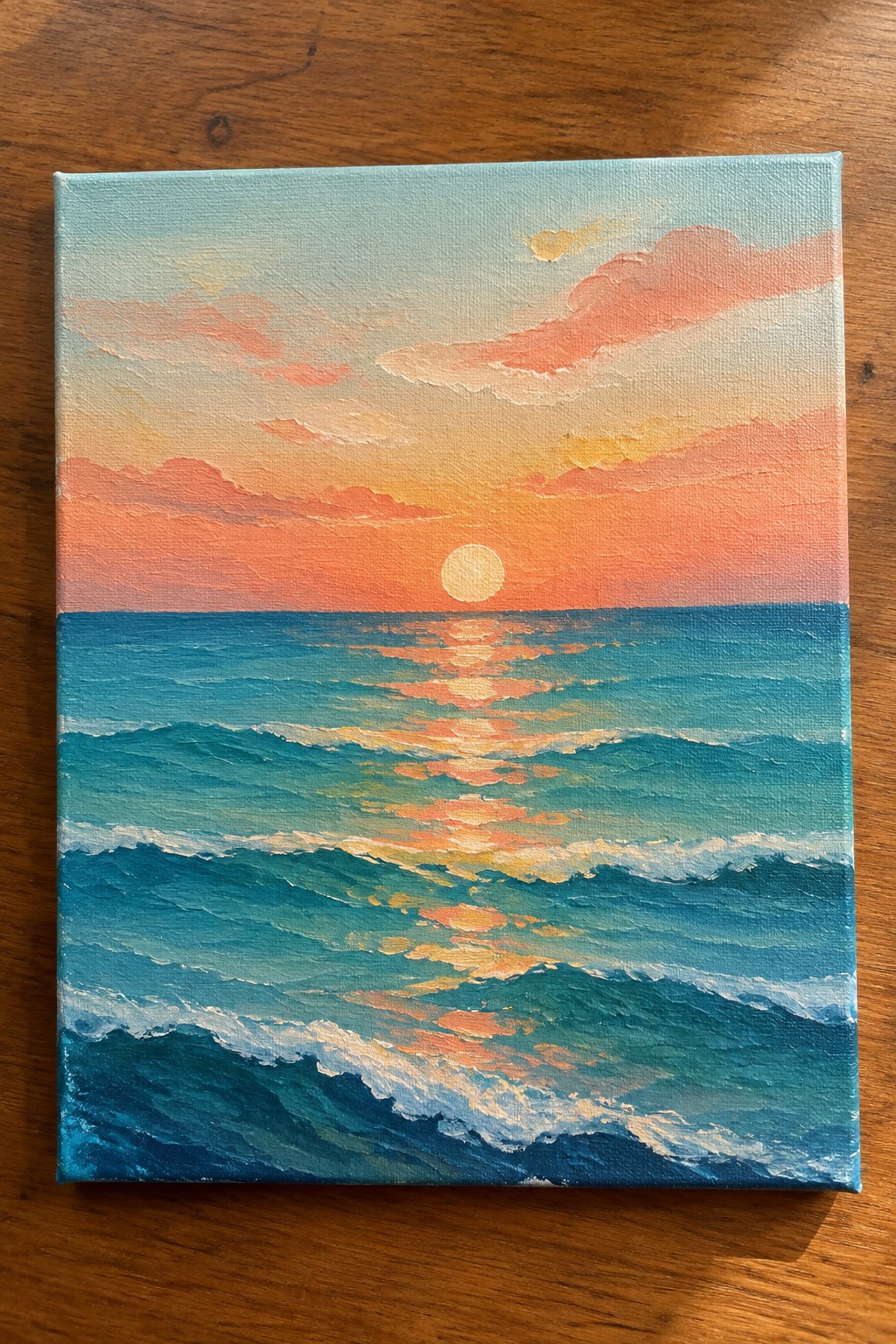 Oil painting of blue waves reflecting pink-orange sunset over calm sea