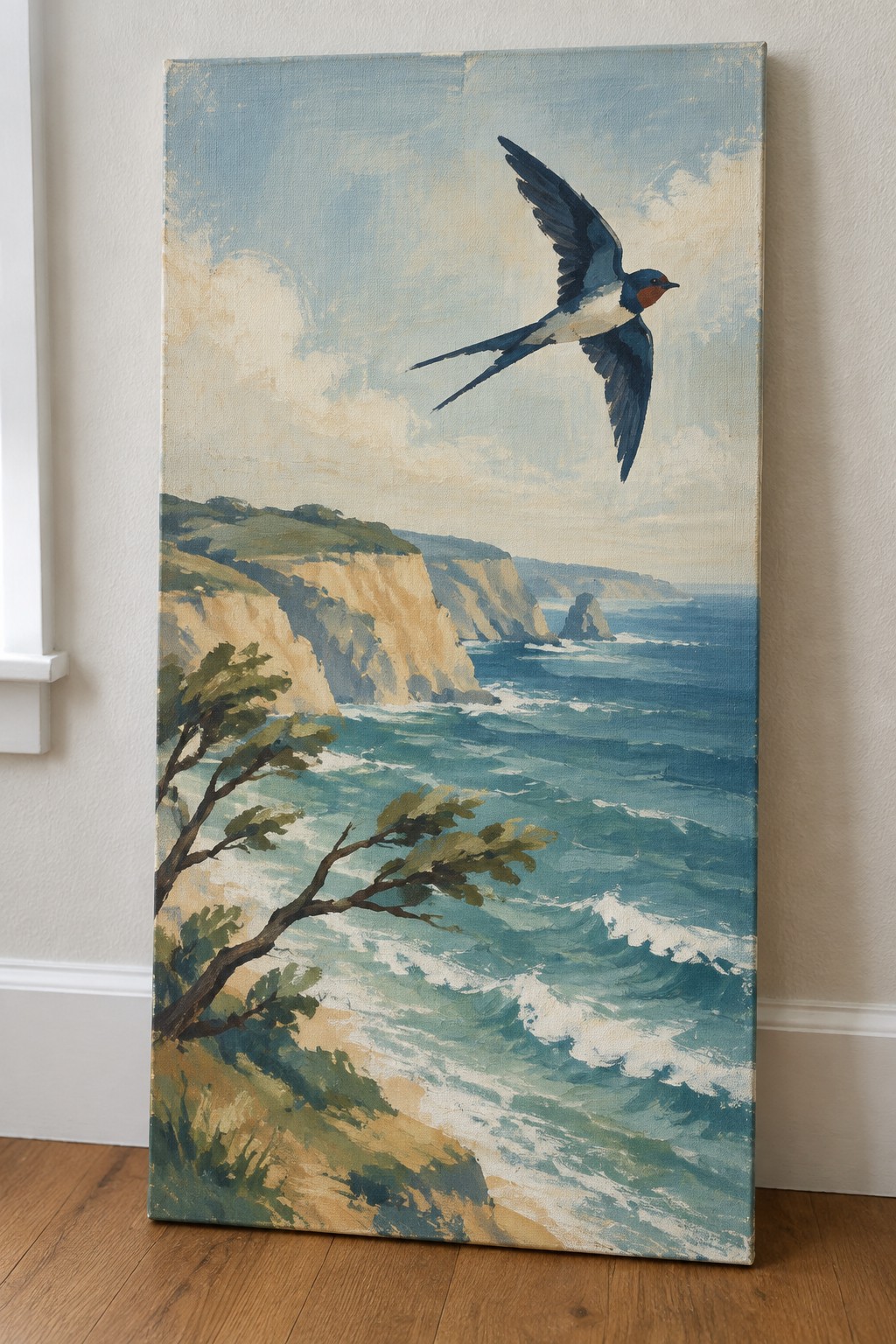 Painting of swallow flying over rocky cliffs and blue ocean waves with whitecaps