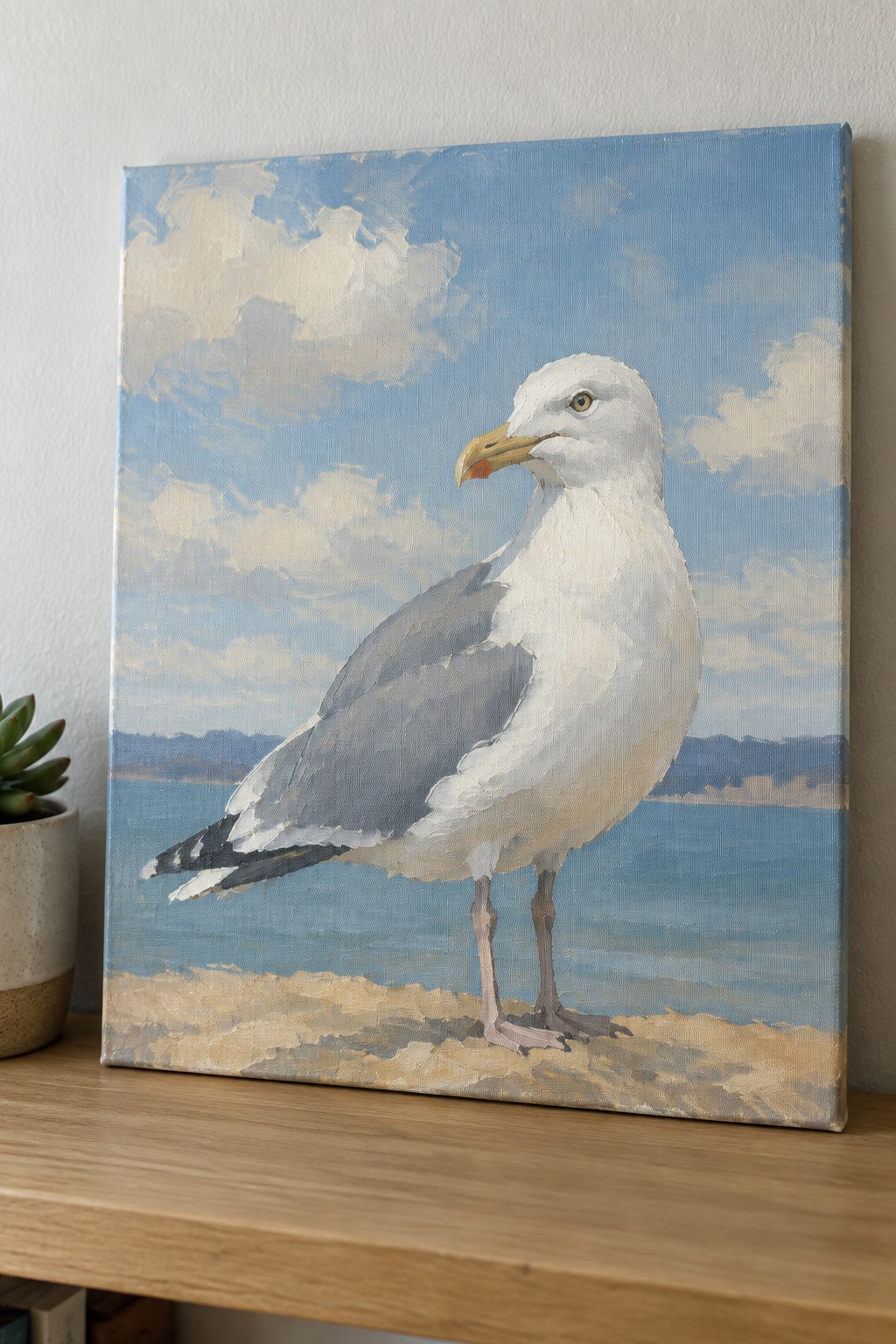 Oil painting of a white seagull standing on a sandy beach by the sea