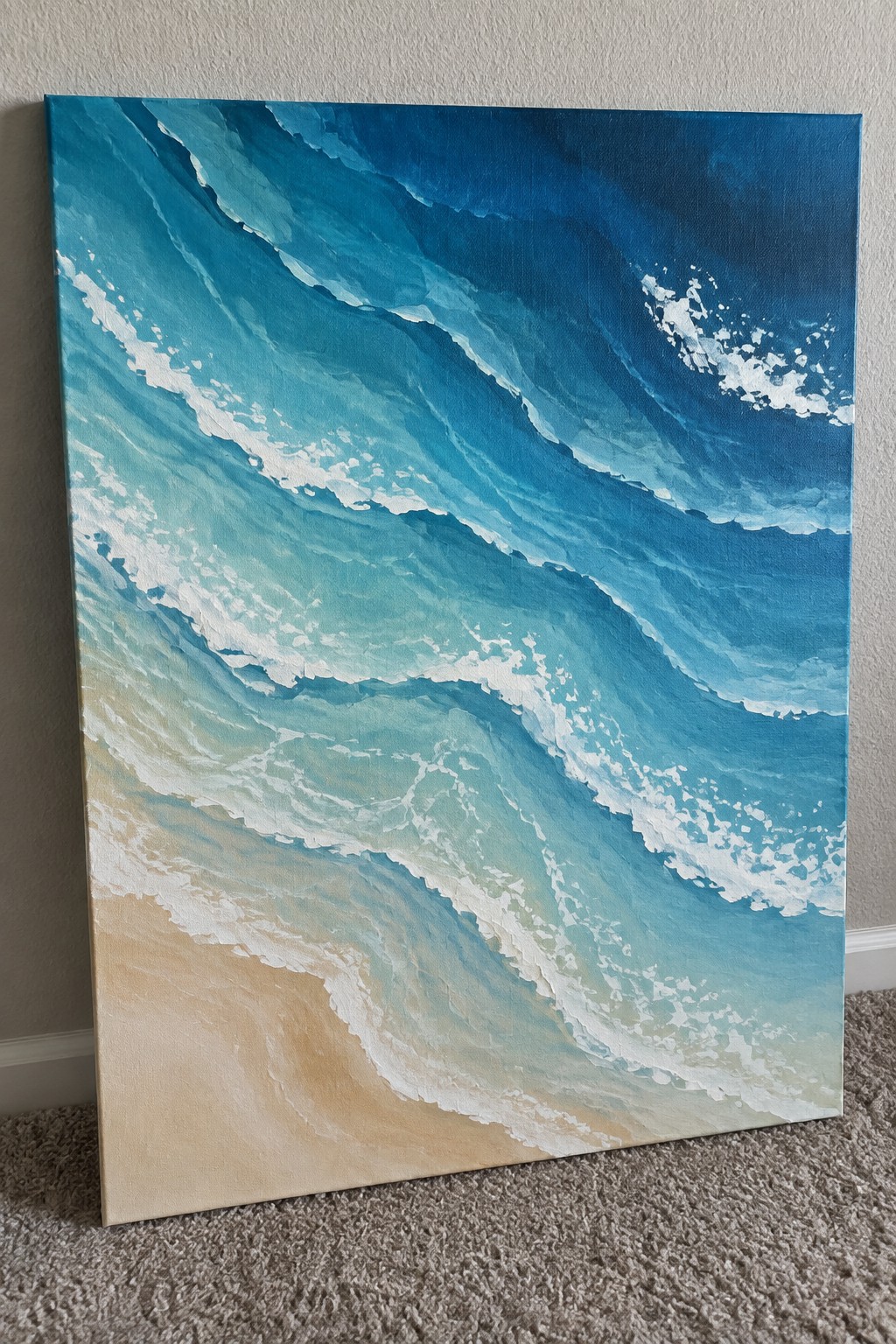 Abstract painting of turquoise ocean waves with white foam on sandy beach